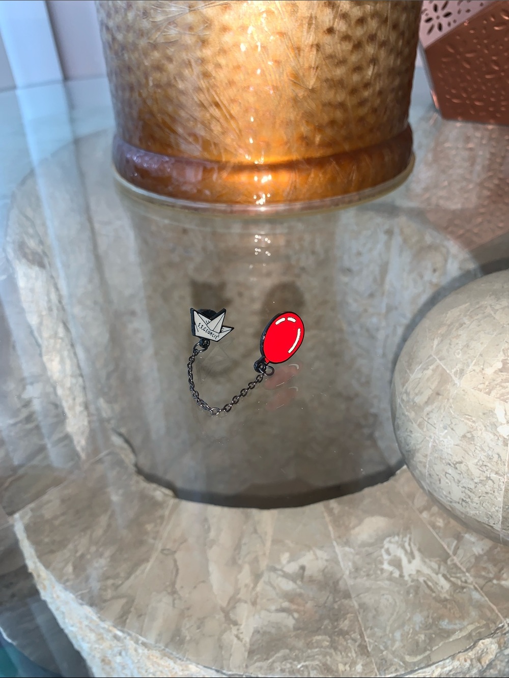 IT-themed enamel pin set featuring the S.S. Georgie paper boat and a red 🎈